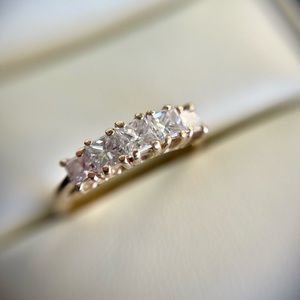 5 stone anniversary ring / diamond wedding band